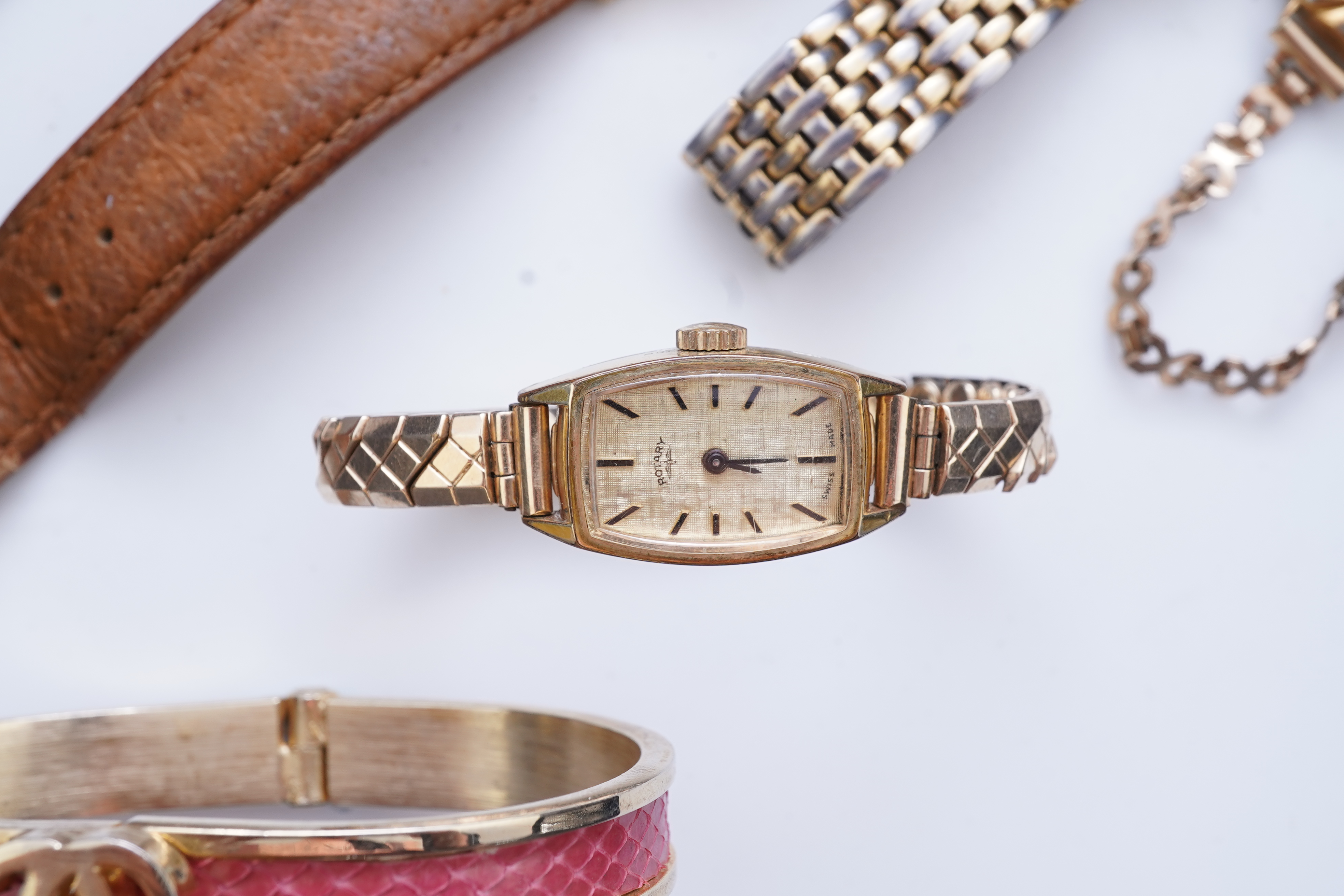 XX REMOVE ROLEX XX, A collection of watches and a bangle, comprising: two Seiko quartz watches; a manual winding watch by Larex; a quartz watch by Eterna; a quartz watch by Rotary; and a quartz watch by Pulsar; together